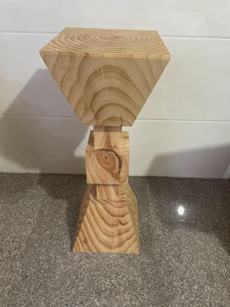 Natural wood kitchen stools set of 4 with geometric base and top.